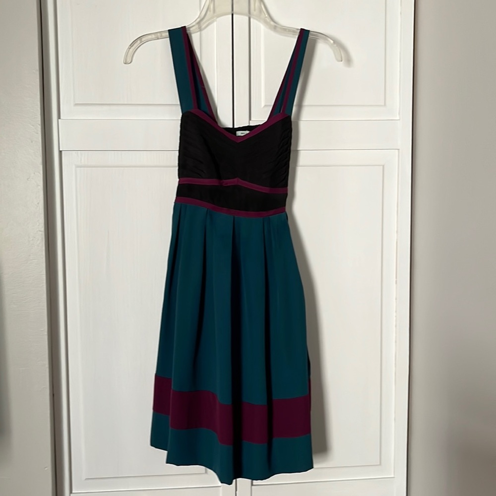 Beautifully made dress with bow tie in the back